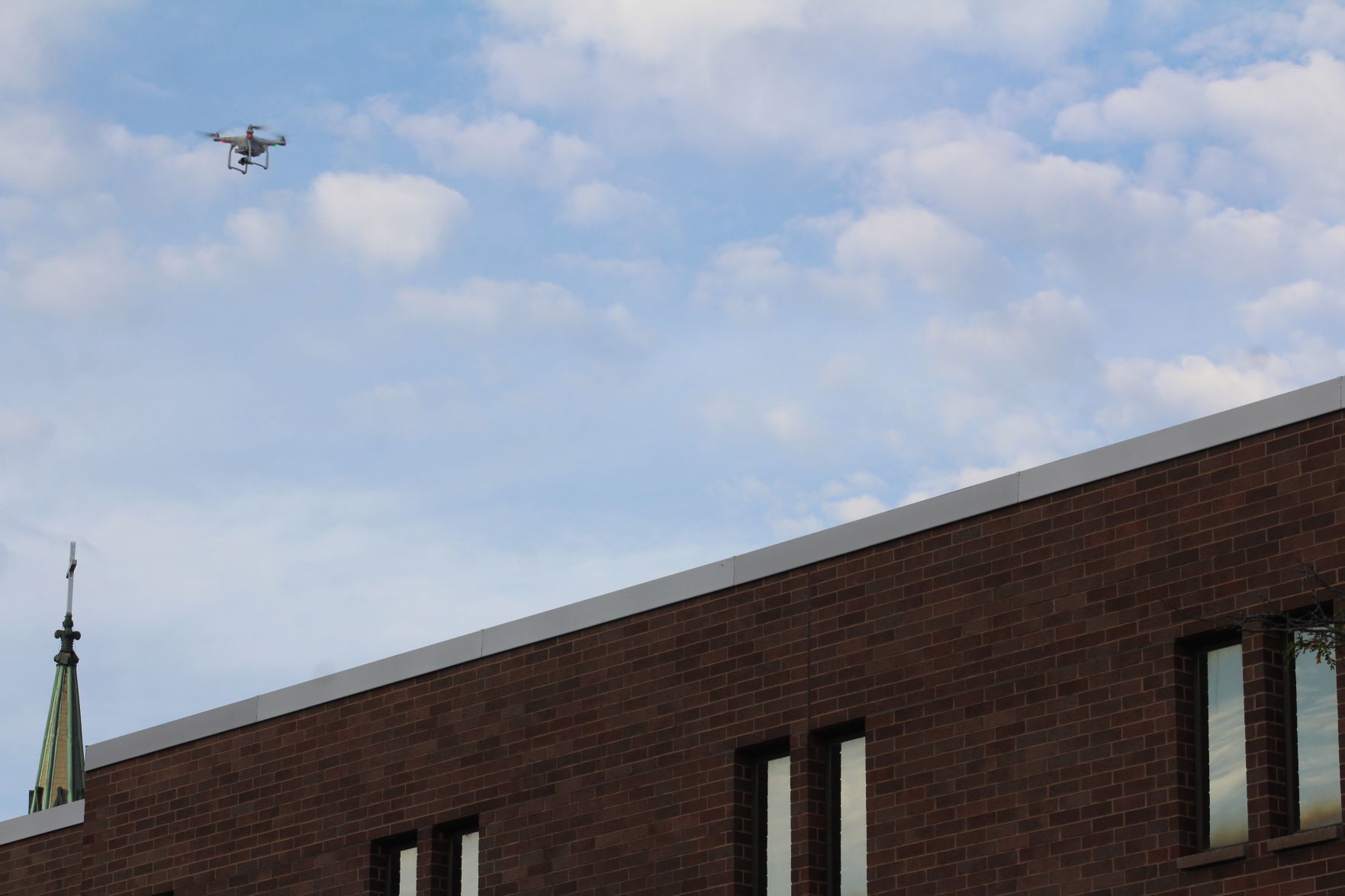 A camera-equipped drone flies above the Racine County Jail